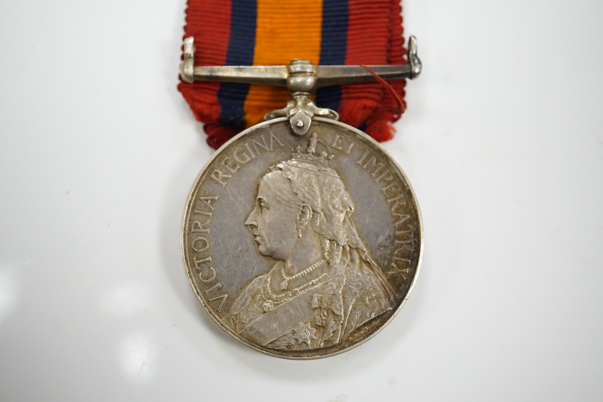 A Queen's South Africa Medal with Relief of Kimberley and Modder River clasps to 324 Pte. J.Aitken, ARG: & SUTH: HIGHRS